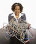 Businesswoman with computer cords.