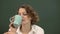 Businesswoman with cup portrait. Close up portrait of elegant serious concentrated clever intelligent lawyer or