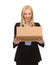 Businesswoman delivering cardboard box