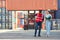 Businesswoman and engineer talking and checking loading Containers box from Cargo freight ship for import export. shipping in