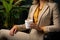 Businesswoman enjoying a coffee moment in the office, formal business meeting image