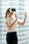 Businesswoman enjoying virtual tour in VR headset