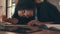 businesswoman falling asleep on his desk in his office