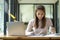 Businesswoman financial advisor sipping coffee while recheck the report