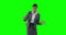 Businesswoman gesturing on green screen