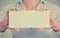 Businesswoman hands holding card sign blank copy space