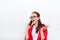 Businesswoman happy excited cell phone call wear red jacket glasses talking on mobile