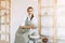 A businesswoman in her pottery shop. A girl at work with clay in a pottery workshop.