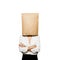 Businesswoman hiding under paper bag