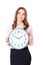 Businesswoman hold a clock and smile