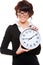 Businesswoman holding clock