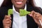 Businesswoman Holding Green Plug In Office