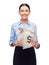 Businesswoman holding money bags with dollar