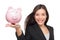 Businesswoman holding piggy bank - savings concept