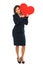 Businesswoman holding red paper heart