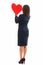 Businesswoman holding red paper heart