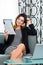 Businesswoman in hotel reading a journal