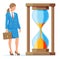 Businesswoman and hourglass