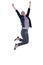 Businesswoman jumping with arms up against white background
