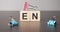 Businesswoman made word en with wood building blocks