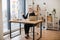 Businesswoman meditating in office chair behind computer