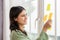 Businesswoman meeting at office and use post it notes, Smiling confident business woman with sticky note on glass wall