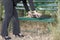 Businesswoman opens briefcase on a bench