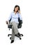 Businesswoman on phone sitting in office chair