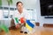 Businesswoman placing flags of Ukraine and Mexico on table in meeting room