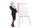 Businesswoman pointing on presentation board