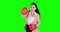 Businesswoman punching with boxing gloves