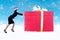 Businesswoman push christmas gift in snow