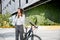businesswoman putting biking helmet prepared cyclists go to work