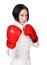 Businesswoman with red boxer gloves