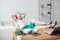 Businesswoman resting relaxing legs on the table hands behind her head and sitting a chair in office.