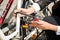 Businesswoman`s Hand Locking Up Her Bicycle