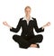 Businesswoman sitting in lotus flower position