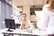 Businesswoman sitting at office desk on business meeting