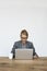 Businesswoman Smiling Happiness Working Laptop Studio Portrait