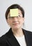 Businesswoman With Sticky Note