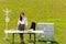 Businesswoman in sunny meadow nature office smile