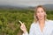 Businesswoman surprised with brackets and pointing at side looking at camera