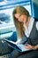 Businesswoman in train coupe