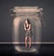 Businesswoman trapped into a glass jar concept