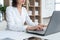 Businesswoman typing on laptop at workplace Woman working in office hand keyboard