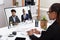 Businesswoman Videoconferencing With Her Colleagues On Computer