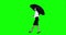 Businesswoman walking with umbrella