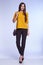 Businesswoman wear yellow silk jacket cotton trousers suit