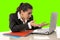 Businesswoman wearing business suit working on laptop computer green chroma key