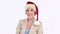 Businesswoman wearing a Santa Claus hat